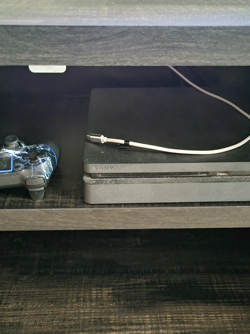 Sony Black PlayStation Slim Console with Black/Blue Controller